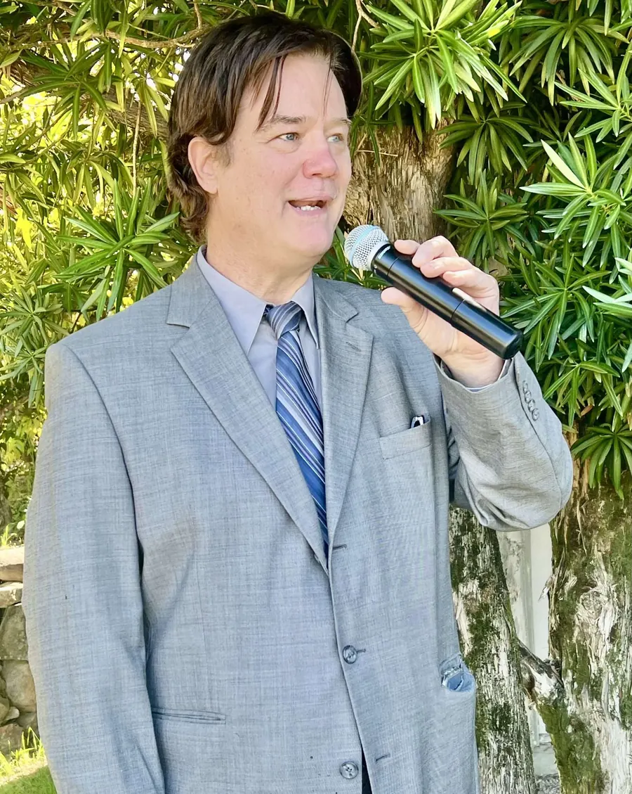DJ Mike Flanagan hosting an outdoor celebration